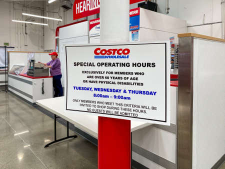 Social distancing information for shoppers at Costco during COVID-19 pandemic. Coronavirus virus and...