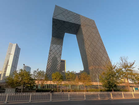 The CCTV Tower of Beijing, China. CCTV Headquarters during blue day in Beijing, The CCTV building is...
