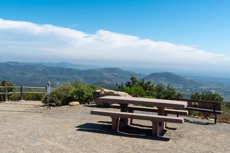 Resting area with bench on the top of the Double Peak Park in San Marcos. 200 acre park featuring a play area and hiking trails that lead to a summit.の写真素材