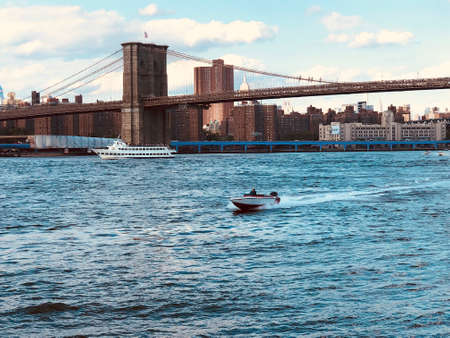 Brooklyn Bridge and Manhattan skyline, New York City downtown. New York City panoramic view of Brooklyn Bridge with Hudson river. October 22nd, 2020のeditorial素材