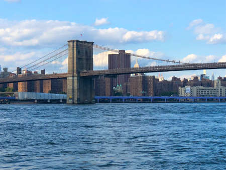 Brooklyn Bridge and Manhattan skyline, New York City downtown. New York City panoramic view of Brooklyn Bridge with Hudson river. October 22nd, 2020のeditorial素材