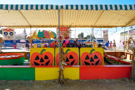 Kiddie rides, slides, inflatable play centers at Halloween fair, San Diego, California, USA, October 22nd, 2019のeditorial素材