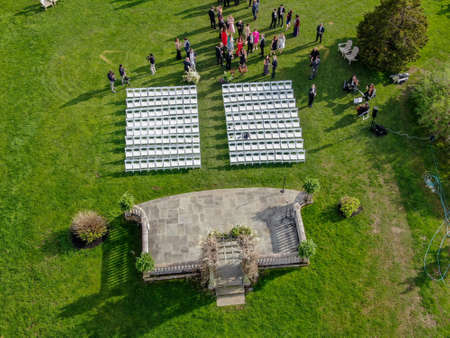 Aerial view of wedding reception ceremony and people enjoying a drink before ceremony start. Castle Hill Inn, Newport, Rhode Island, USA.. May 13th, 2019のeditorial素材