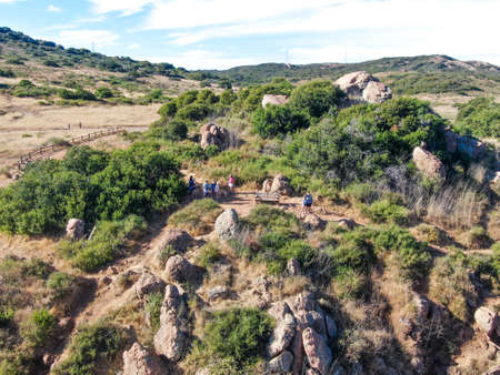 Aerial view of Los Penasquitos Canyon Preserve with tourist and hikers looking at the view. Urban park with trails and river in San Diego, California. USA. May 30th, 2020のeditorial素材