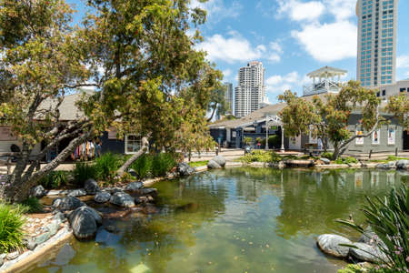 Little green lush and water pound at the Seaport Village, waterfront shopping and dining complex in San Diego, famous travel tourist attraction. South California. USA. June 5th, 2020のeditorial素材