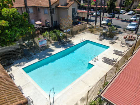 Aerial view middle class neighborhood condo community swimming pool in Rancho Bernardo, South California, USA. June 20th, 2020のeditorial素材