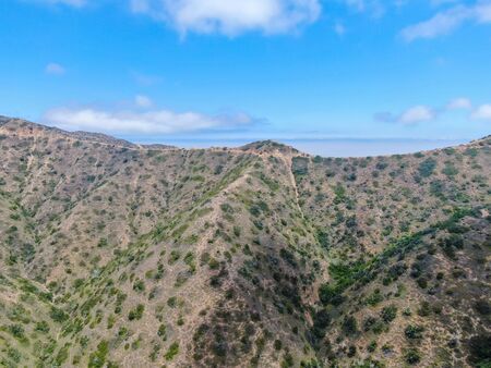Aerial view Santa Catalina Island mountain peaks with blue sky. California, USAの写真素材