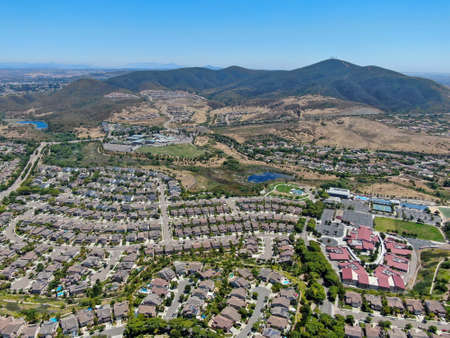 Aerial view of suburban neighborhood with big mansions in San Diego, California, USA. Aerial view of residential modern subdivision luxury house.の写真素材