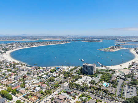 Aerial view of Mission Bay and Pacific Beach in San Diego, California. USA. Community built on a sandbar with villas, sea port and recreational Mission Bay Park. Californian beach-lifestyle.の写真素材