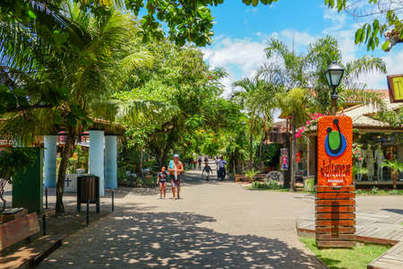 Famous main walking street for tourists and shopping, bar and restaurant in Praia Do Forte, State of Bahia, Brazil. February 22nd, 2020のeditorial素材