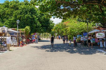 Famous main walking street for tourists and shopping, bar and restaurant in Praia Do Forte, State of Bahia, Brazil. February 22nd, 2020のeditorial素材
