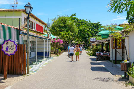 Famous main walking street for tourists and shopping, bar and restaurant in Praia Do Forte, State of Bahia, Brazil. February 22nd, 2020のeditorial素材