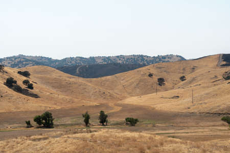 The San Luis Reservoir valley during dry and hot season, San Luis Creek in the eastern slopes of the...