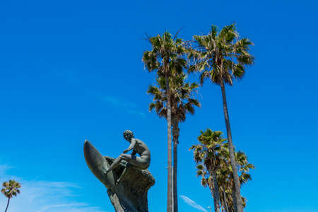 Nude Dude, the unclothed surfer statue in Huntington Beach. Huntington Beach surfer statue in Orange county California. USA. September 26th, 2020のeditorial素材