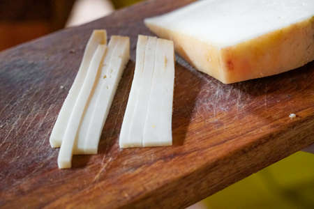 Degustation cheese board at the cheese farm store, dry aged cheeses