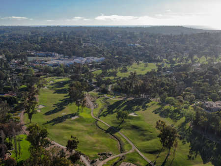 Aerial view over golf field. Large and green turf golf course in South California. USA