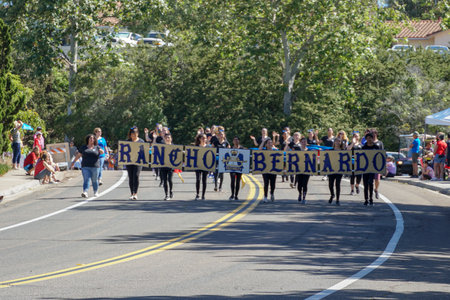 Del Norte High School Nighthawks Marching Band, 4th July Independence Day Parade at Rancho Bernardo, San Diego, California, USA. Young student parading with flags and playing music. July 4th 2019のeditorial素材