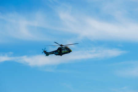 Sheriff Helicopter Hovering on a Beautiful Sky Background. Sheriff Department helicopter on a routine surveillance mission in Santa Monica. Los Angeles, California, USA. March 22nd, 2021のeditorial素材