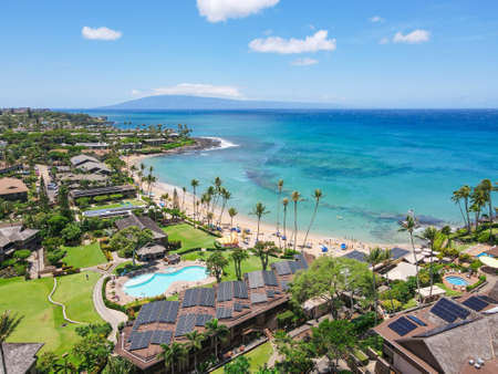Aerial view of tropical destination with white sand and turquoise water. Kapalua coast in Maui,...
