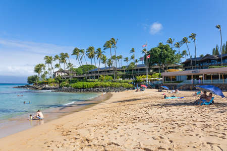Tourist enjoying tropical beach with white sand and crystal clear water in Maui, Hawaii, USA, August 22nd, 2021のeditorial素材