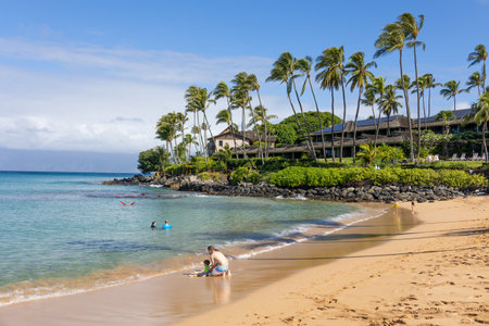 Tourist enjoying tropical beach with white sand and crystal clear water in Maui, Hawaii, USA, August 22nd, 2021のeditorial素材