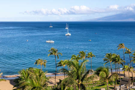 Sailboat in the open sea. Calm sea sailing, luxury summer adventure, active vacations. Maui, Hawaiiの写真素材