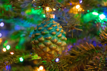 Christmas tree branch decorated with ball decor, holiday conceptの写真素材