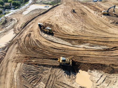Aerial view of heavy construction equipment working at the construction site. San Diego, California, March, 10th, 2024のeditorial素材