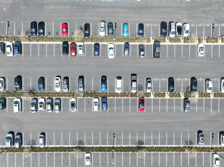 Open car parking lot viewed from above, aerial top view