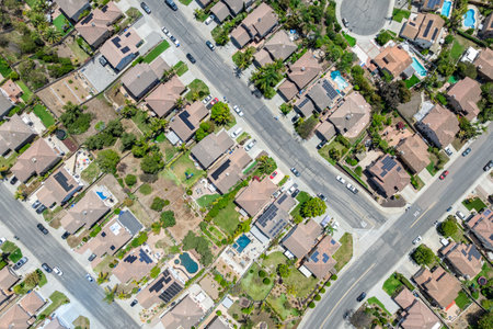Aerial view of San Marcos neighborhood with houses and street during sunny day, California, USA.の写真素材