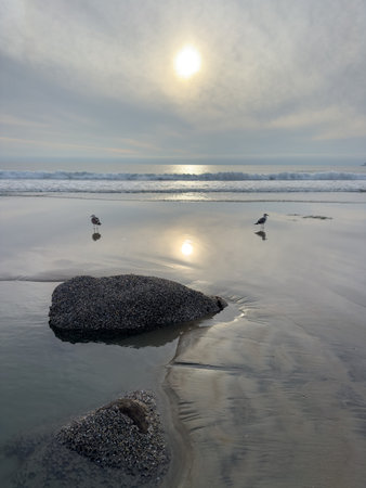 Stunning view at beach with coastal rocks and clear ocean water. High quality photo