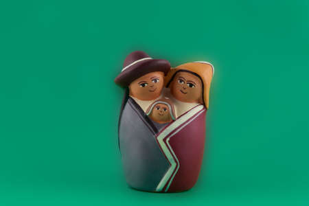 Miniature of a family composed by father, mother embracing their baby.の写真素材