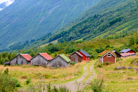 A small village with its little houses in the middle of the Norwegian nature.の写真素材