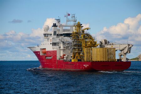 NORWAY - Aug, 12: The cargo ship Fugro Saltire cruises towards the open sea near Trondheim, Norway...