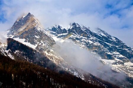 A view of the big mountains in Gran Paradiso National Park, located in Val d'Aosta, Italy. These are...