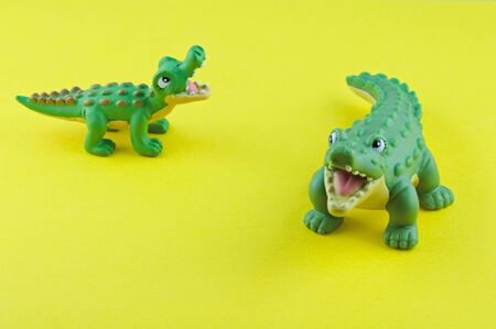 Miniature of a crocodile family composed by mummy and a baby.
