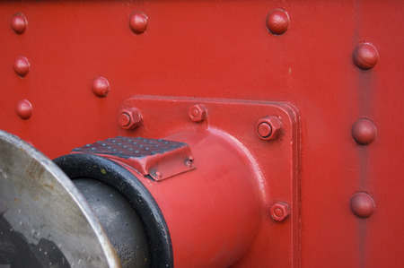 Sprung buffer used at the extreme ends of railway vehicles, used to absorb the forces of acceleration and braking between vehicles.の写真素材