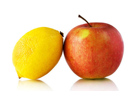 Lemon and apple isolated on white backgroundの写真素材