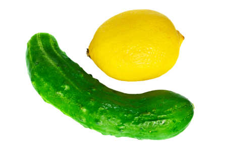 Lemon and cucumber isolated on white backgroundの写真素材