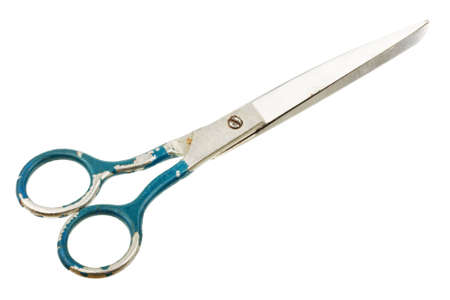 Old scissors isolated on white background