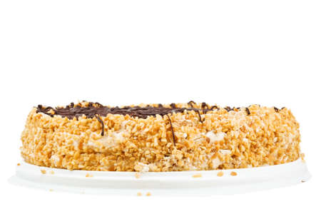 Piece of cake on a plastic plate, on white backgroundの写真素材