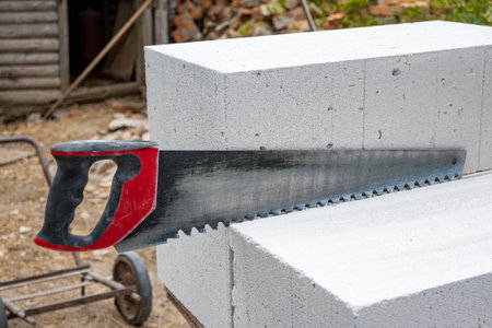 Aerated concrete blocks, aerated concrete saw. Construction of aerated concrete bricks, blocks. High quality photoの写真素材
