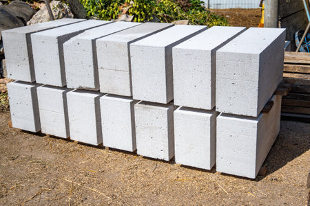 Storage of aerated concrete blocks close-up. Laying aerated concrete blocks. Construction of aerated concrete blocks, bricks. High quality photoの写真素材