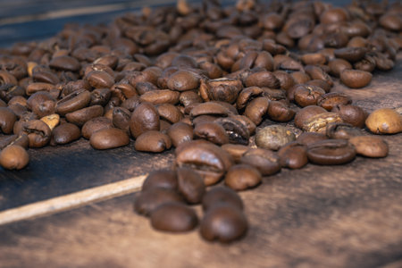 Closeup of coffee beans for background and texture. Coffee beans background. Light roast coffee.