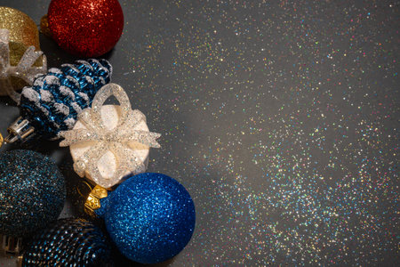 Christmas banner with Christmas decoration, gifts on a gray shiny background with copy space.