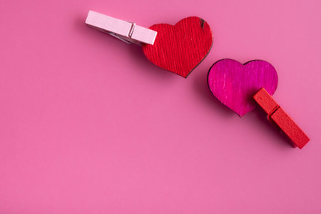 Hearts on pink background, symbol of love, happy woman, mother, Valentines day, birthday card designの写真素材