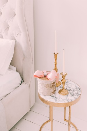 Blurred background. Luxury living room interior with sofa decorated chic Christmas tree, gifts,...