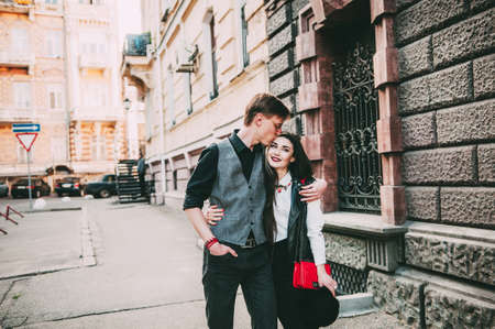 couple walking while holding handsの写真素材