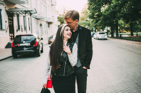 couple walking while holding handsの写真素材