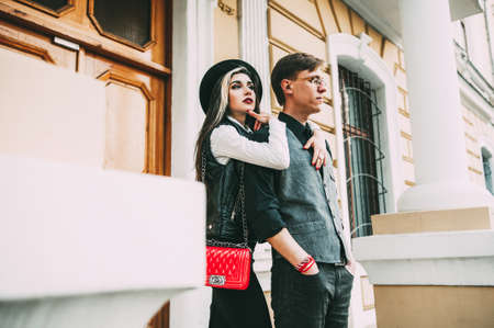 couple walking while holding handsの写真素材